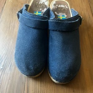 Vintage MIA wood base clogs with blue suede upper.